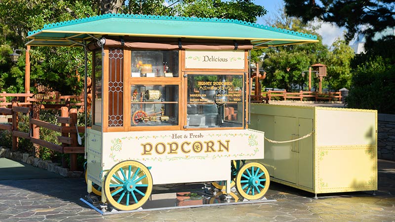 image of In front of Pooh’s Hunny Hunt (Popcorn wagon)